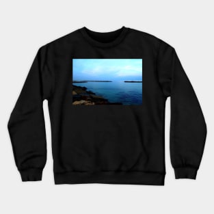 Deep blue Adriatic sea with a coast full of massive rocks Crewneck Sweatshirt